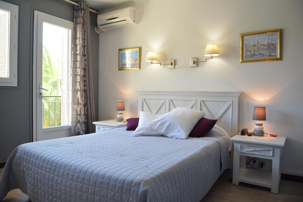 Hotel Le Grillon Л'Иль-Рус Экстерьер фото